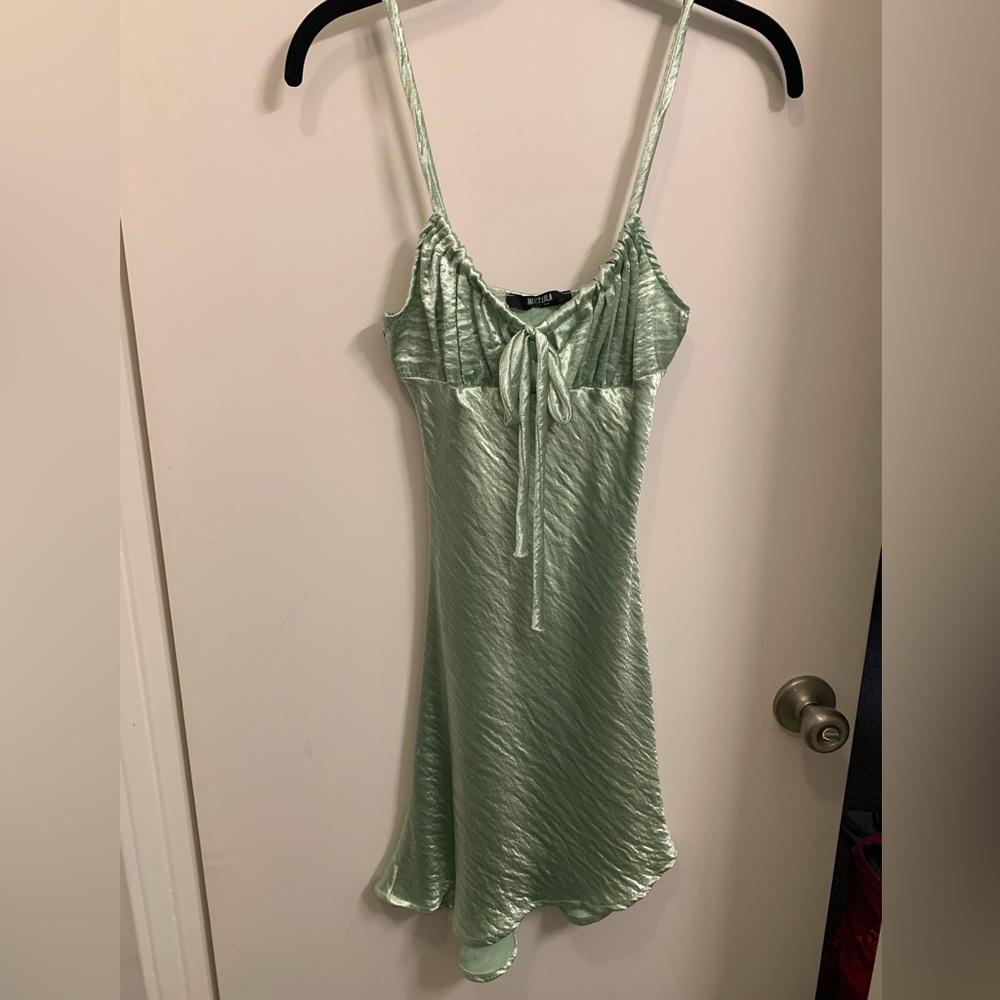 Miss Lola
Mint colored dress 
Size small
Never worn with tags still attached